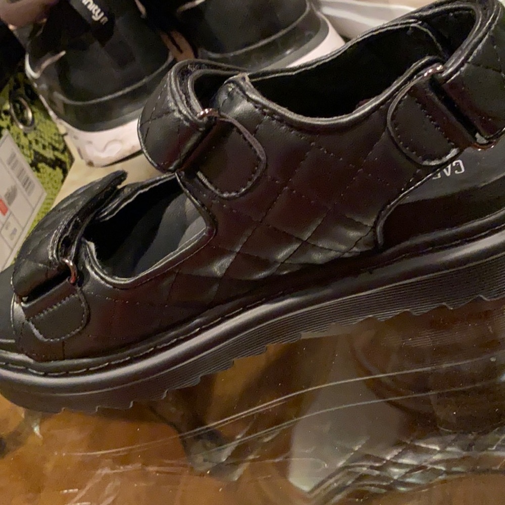 Brand new size 8 black sandals.